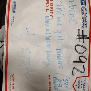 Infant girls romper.            4/$12